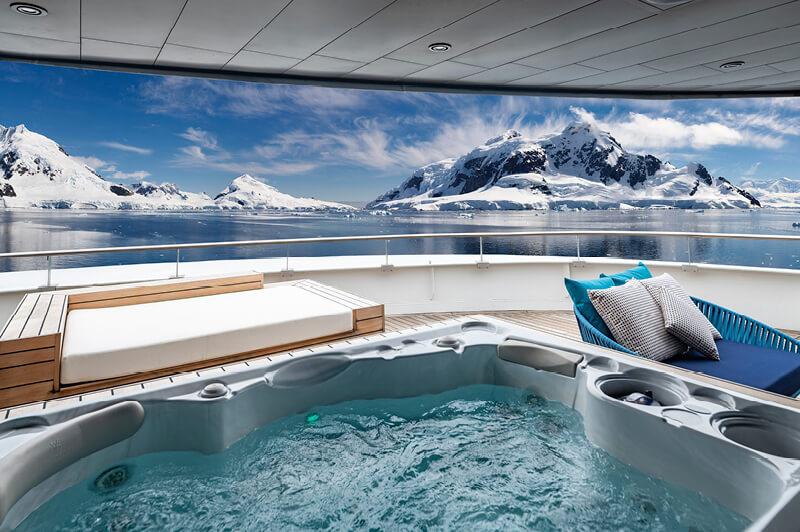 The Owner’s Penthouse Suites feature a private jacuzzi with unparalleled scenic vistas luxury cruise