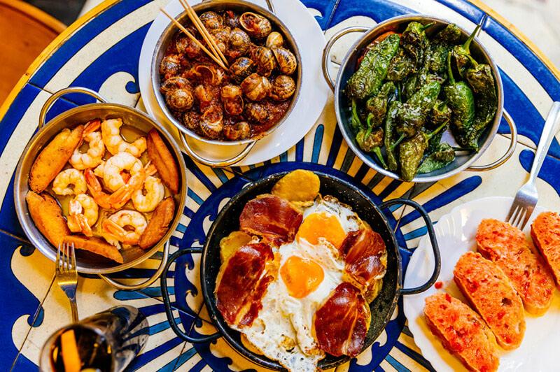 Barcelona’s tapas scene is a masterclass in Mediterranean flavour.