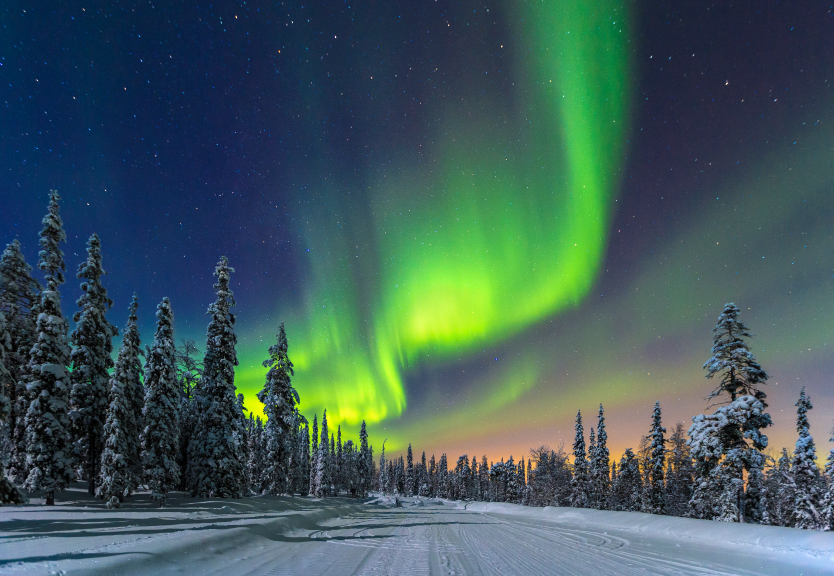 The northern lights, or Aurora Borealis, are a natural light phenomenon that occurs in the Arctic regions of the northern hemisphere as seen here in Finland.