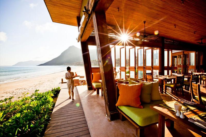 Beachside suites and villas are crafted from reclaimed teak. Image: Six Senses Con Dao.