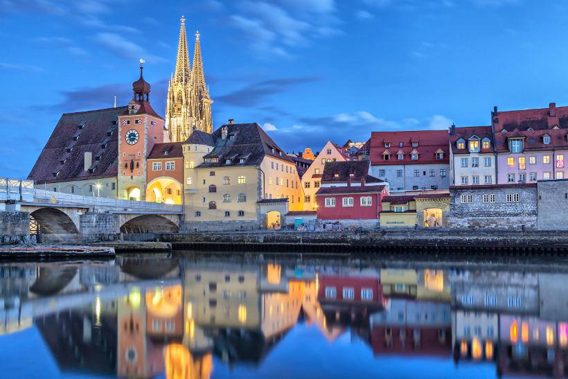 Travel Associates german town on river at nighttime