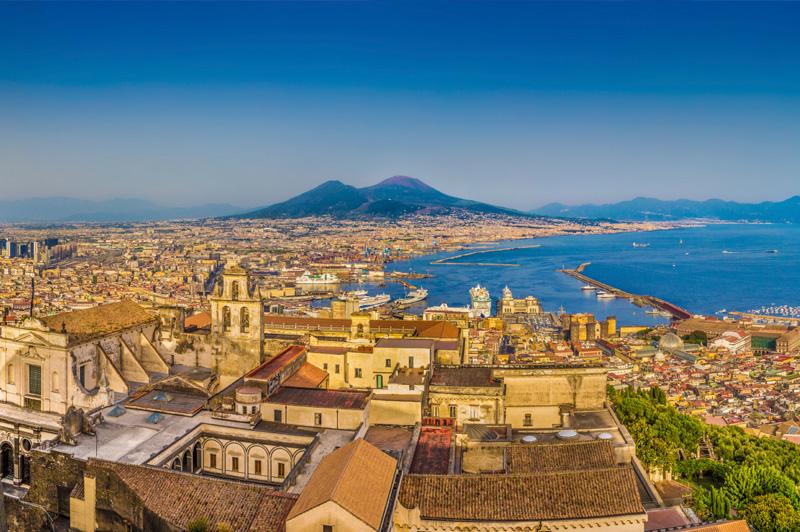 The city of Naples with Mount Vesuvius at sunset. Image: Getty