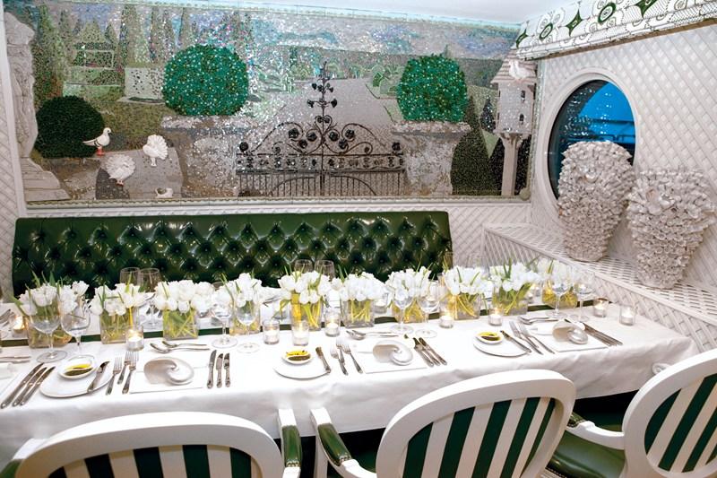 This image: Meal setting in the comfortable Restaurant de Versailles on board the SS Antoinette.